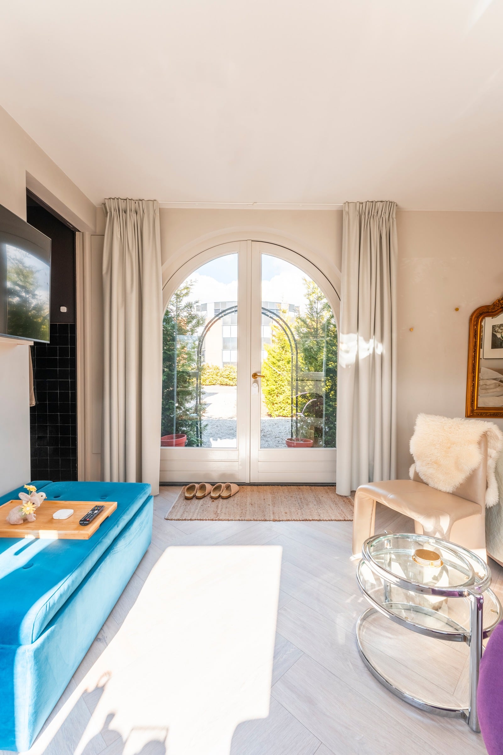 Arched French doors opening onto the garden
